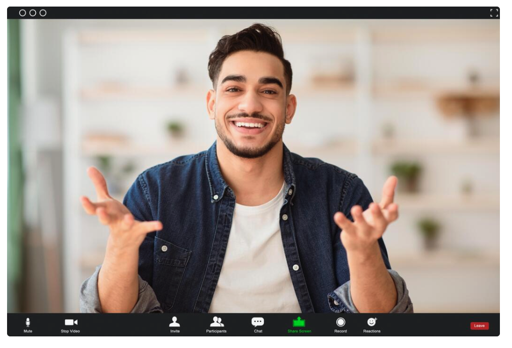 A candidate smiling during a live video interview